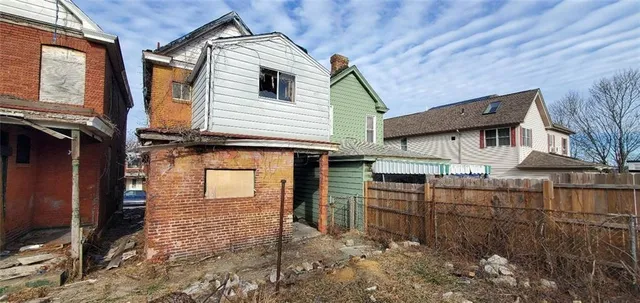 a view of a house with a street