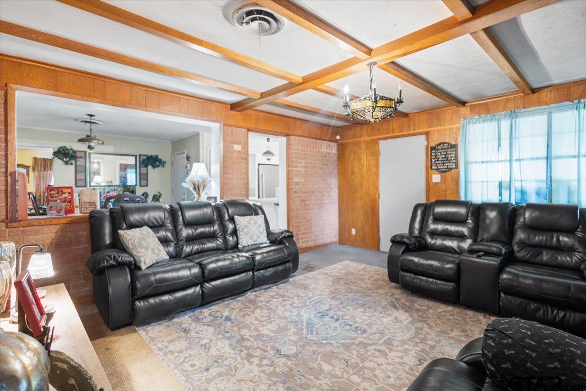 3211 Shady Trail Drive Tyler, TX 75702 - Photo 13 of 30 a living room with furniture and a large window