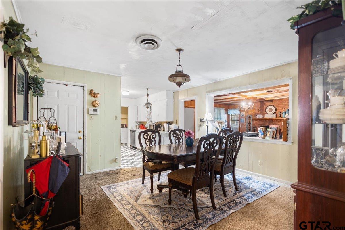 3211 Shady Trail Drive Tyler, TX 75702 - Photo 7 of 30 a view of a dining room with furniture window and outside view