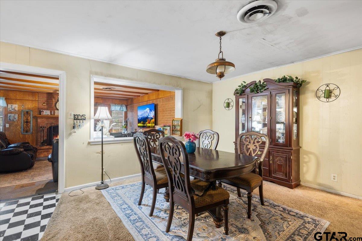 3211 Shady Trail Drive Tyler, TX 75702 - Photo 8 of 30 a view of a dining room with furniture