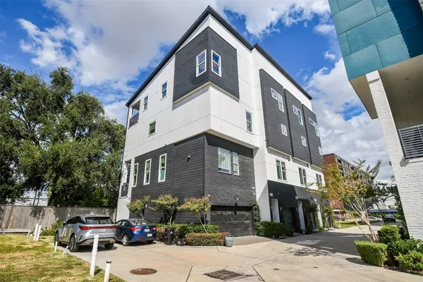 a front view of a building with street view