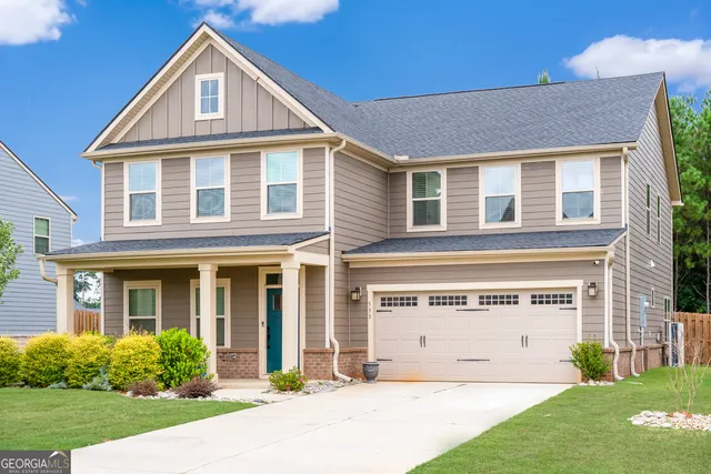 front view of a house with a yard
