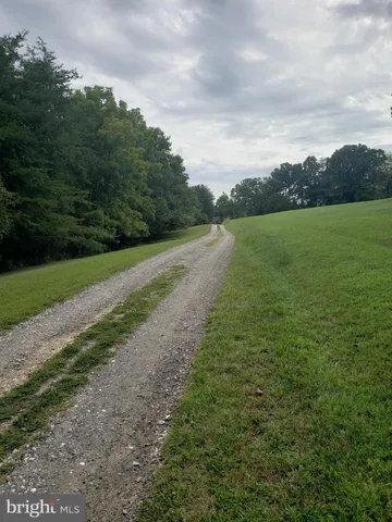 a view of a lake with a big yard