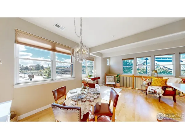 a kitchen with a sink a counter top space and stainless steel appliances