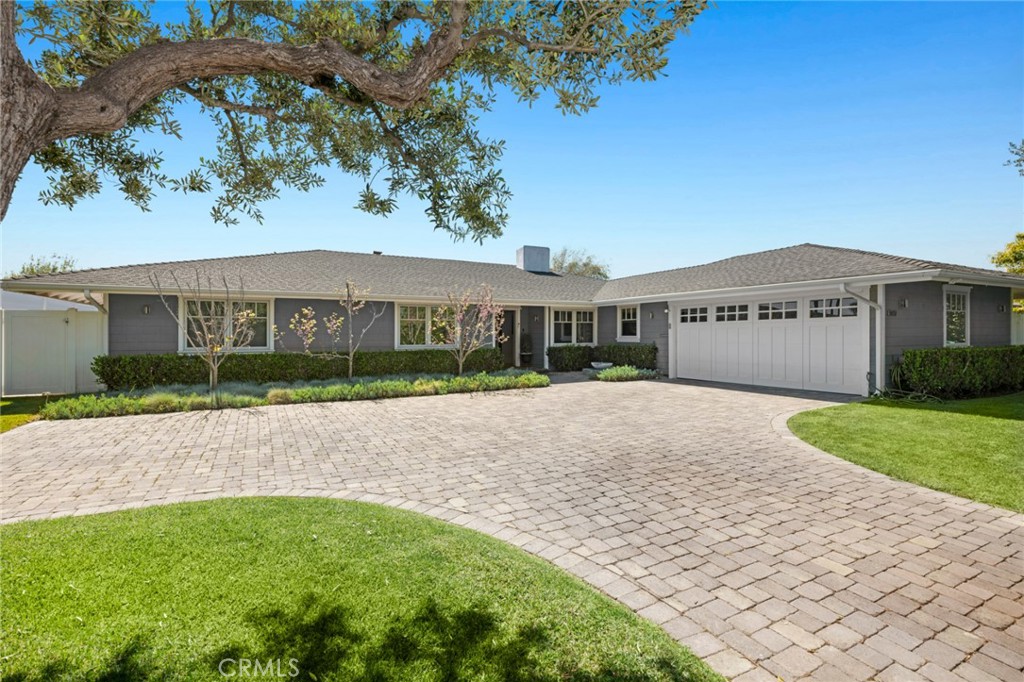 a view of house with outdoor space
