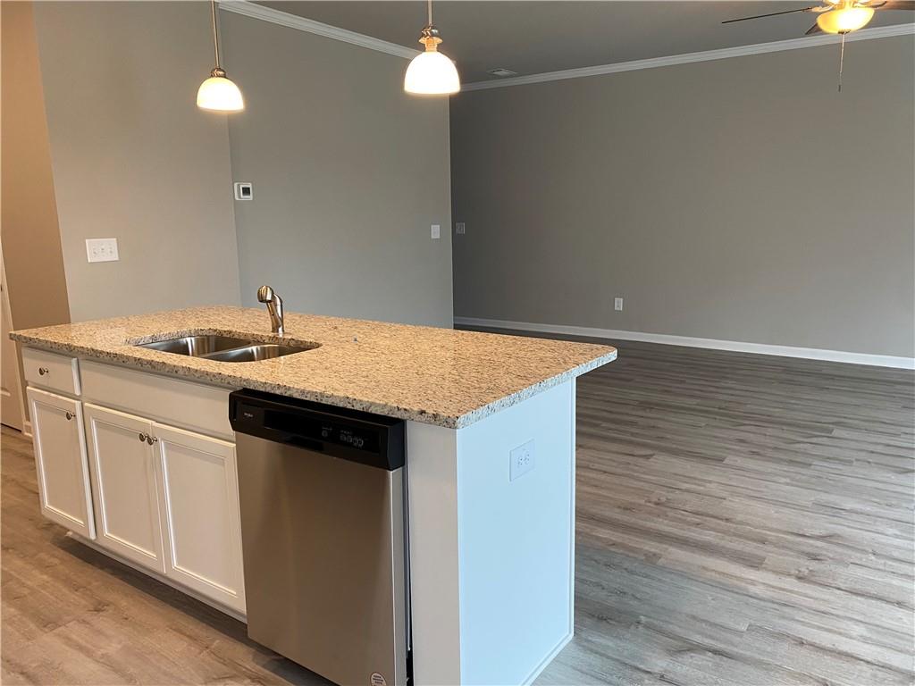5282 Fox Den Road Oakwood, GA 30566 - Photo 11 of 14 a kitchen with a sink and cabinets