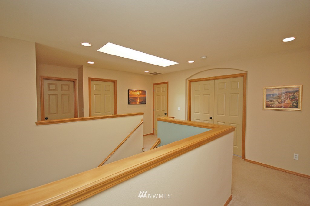 21107 1st Avenue West Bothell, WA 98021 - Photo 12 of 20 a view of a kitchen with furniture and bathroom