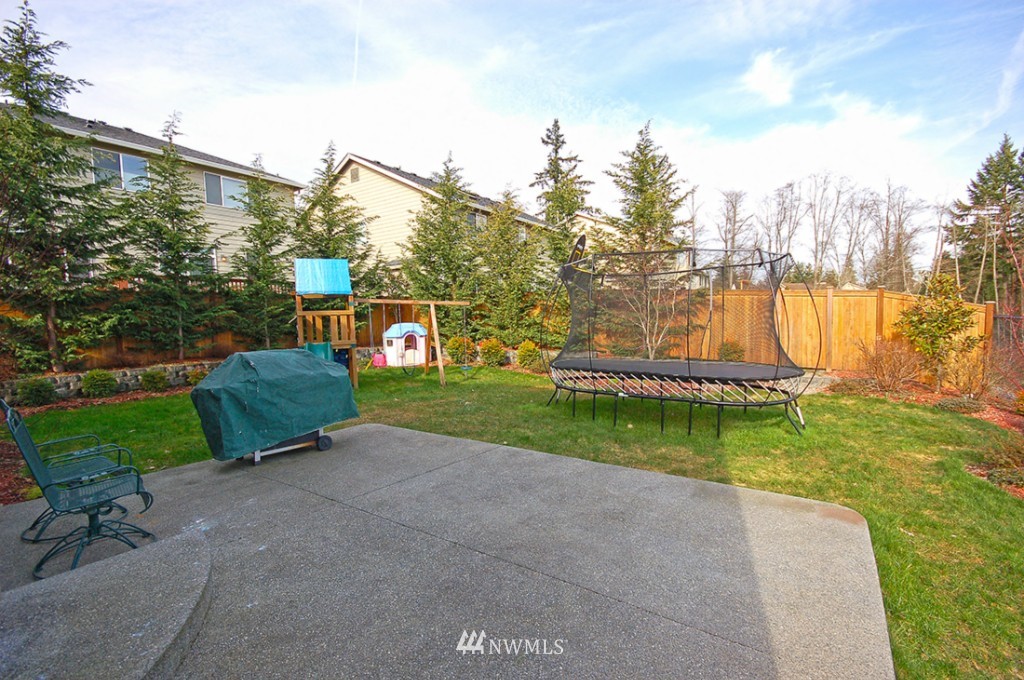 21107 1st Avenue West Bothell, WA 98021 - Photo 8 of 20 a view of a garden with large trees
