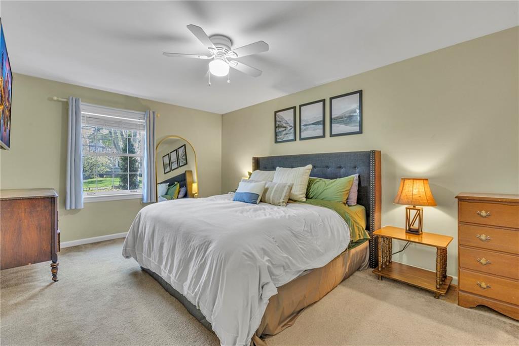 610 Maple Lane, Unit 1 Sewickley, PA 15143 - Photo 13 of 31 a bedroom with a bed and a window