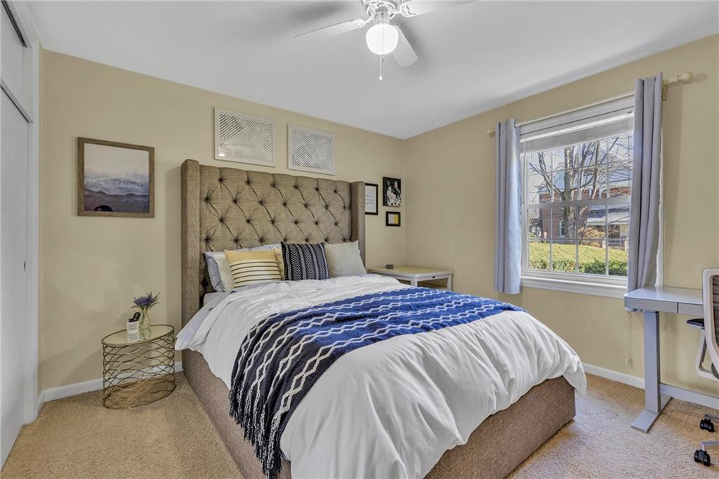 610 Maple Lane, Unit 1 Sewickley, PA 15143 - Photo 16 of 31 a bedroom with a bed and a window