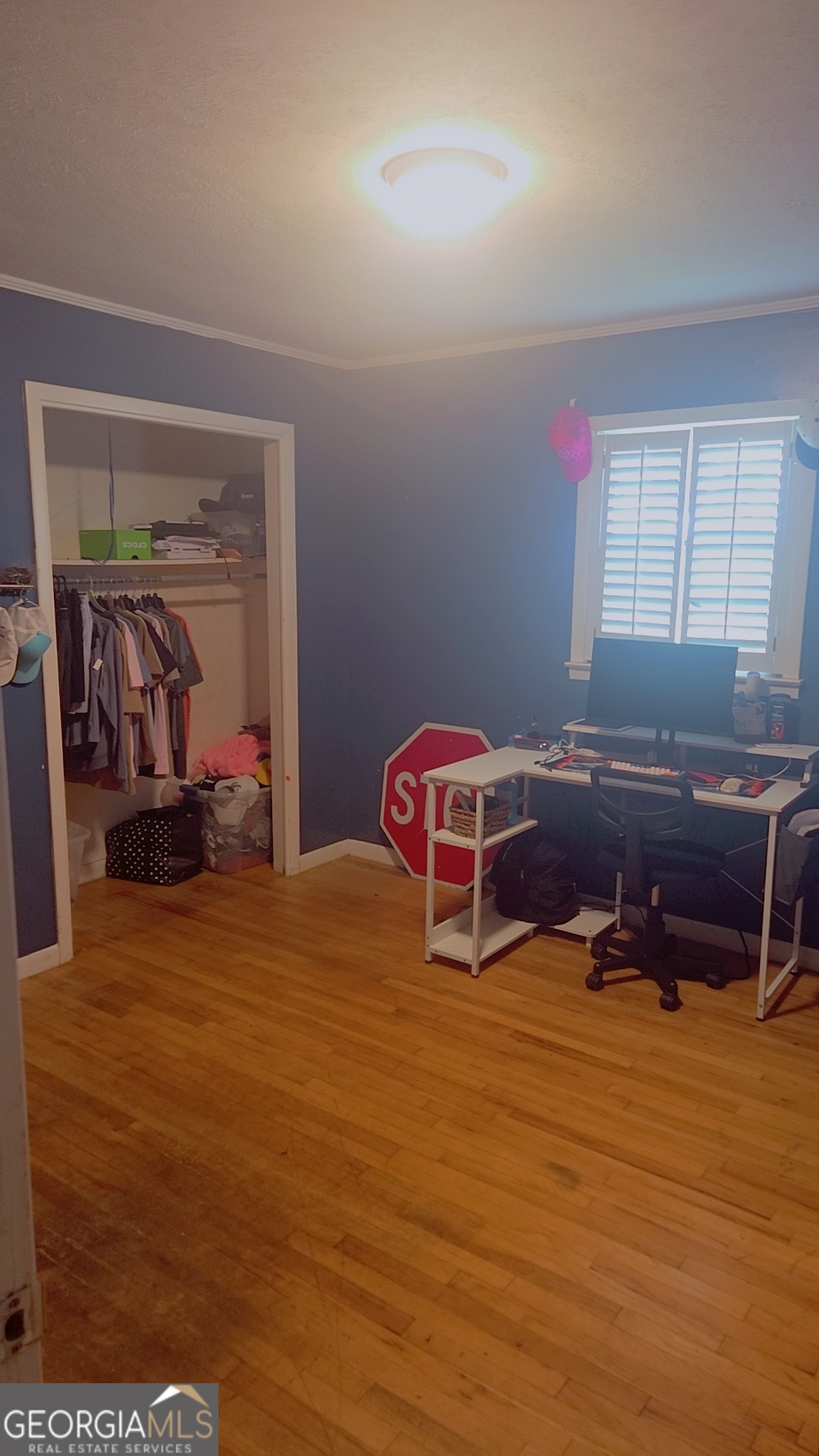 8468 Branchville Road Camilla, GA 31730 - Photo 13 of 22 a bedroom with a bed and a dresser