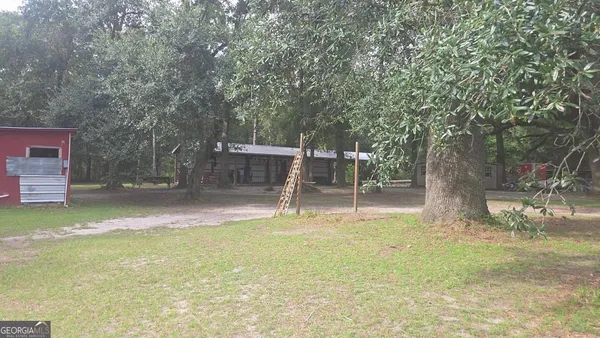 a view of a yard with a slide