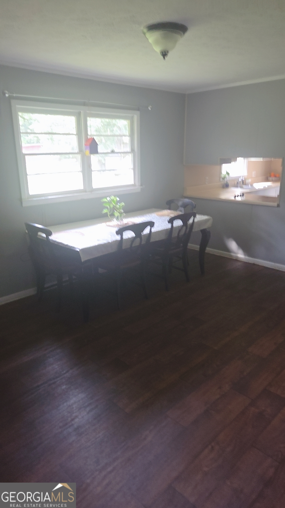 8468 Branchville Road Camilla, GA 31730 - Photo 6 of 22 a view of empty room with window
