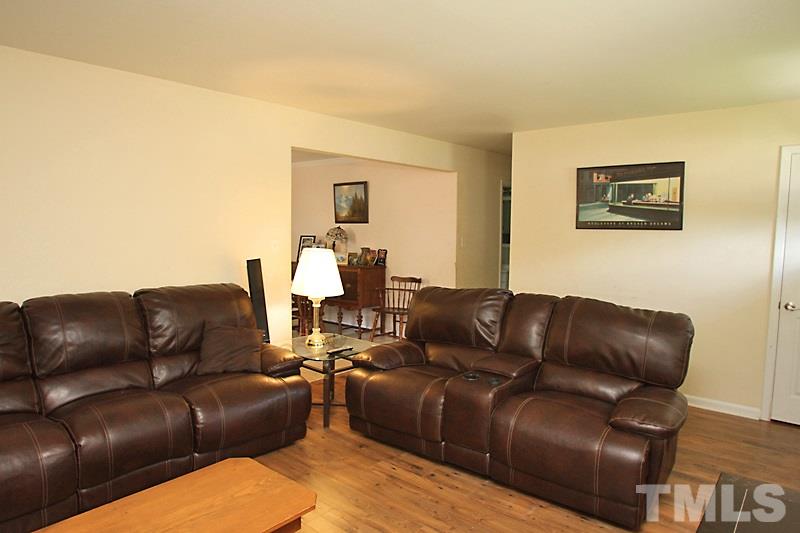 4706 Revere Road Durham, NC 27713 - Photo 3 of 13 a living room with furniture