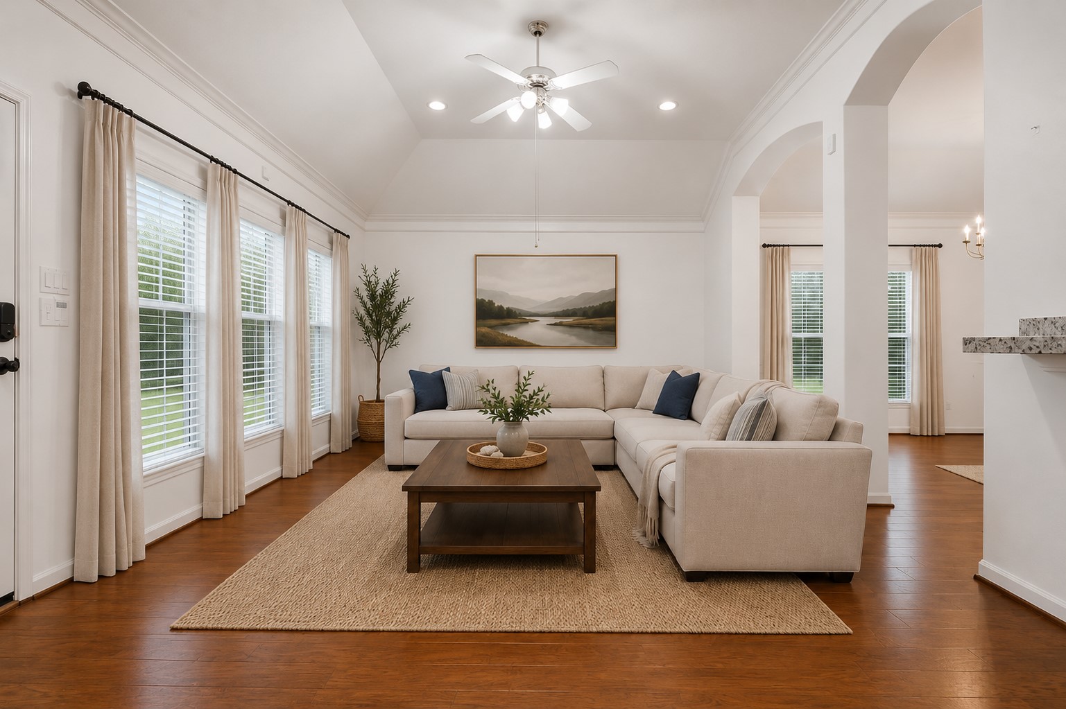 5815 Pheasant Ridge Lane Houston, TX 77041 - Photo 19 of 43 The huge family room features soaring ceilings trimmed with crown molding and a dramatic wall of windows that fills the space with natural light. With no rear neighbors, you can relax and enjoy the peaceful backyard views. This home has been virtually staged.