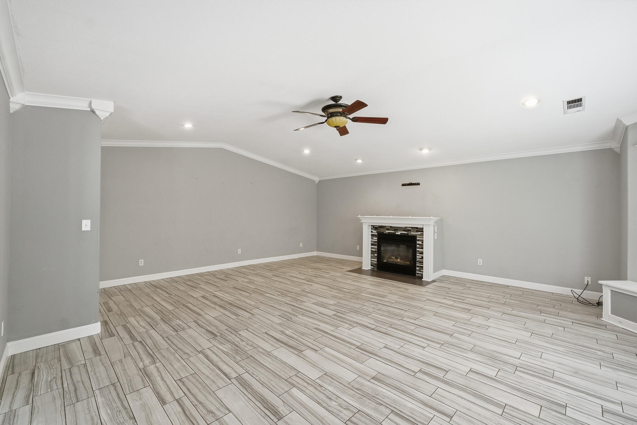 618 Birdsong Court Exeter, CA 93221 - Photo 18 of 62 a view of an empty room with wooden floor