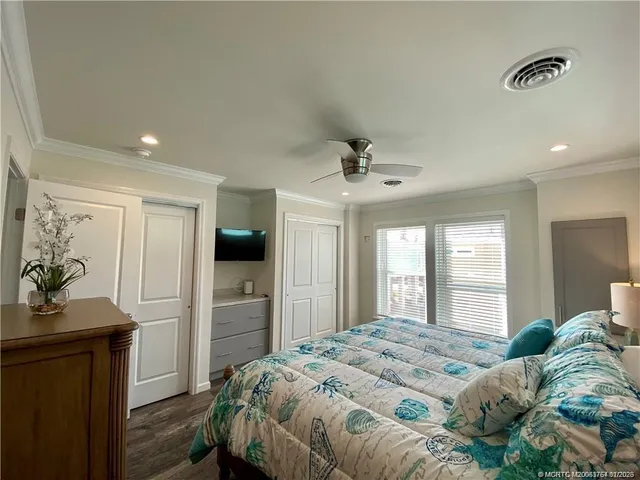 a swimming pool with some trees in the background