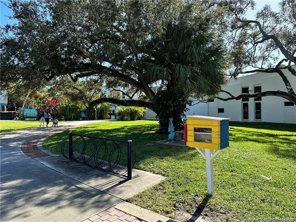 a view of a building with a yard