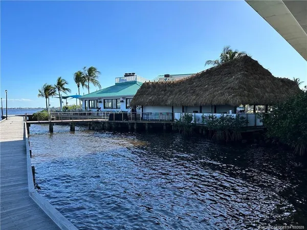 a view of a cafe with sitting area