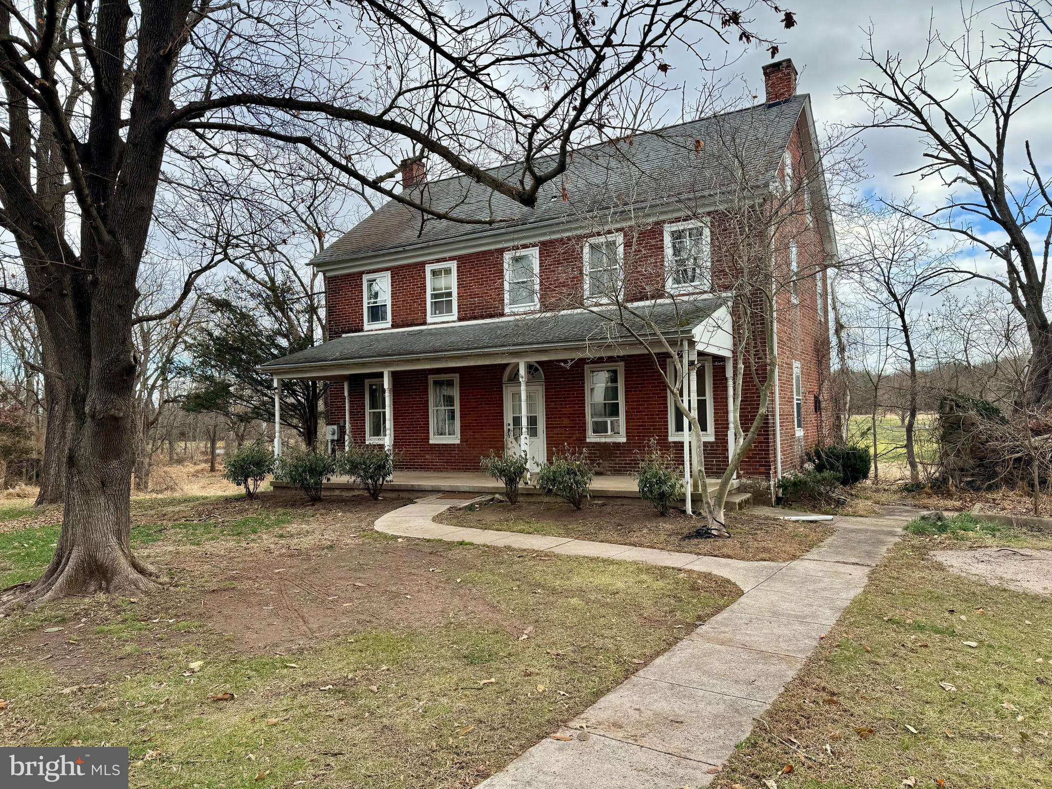 180 Sassamansville Road Gilbertsville, PA 19525 - Photo 1 of 20 a front view of a building with sitting area