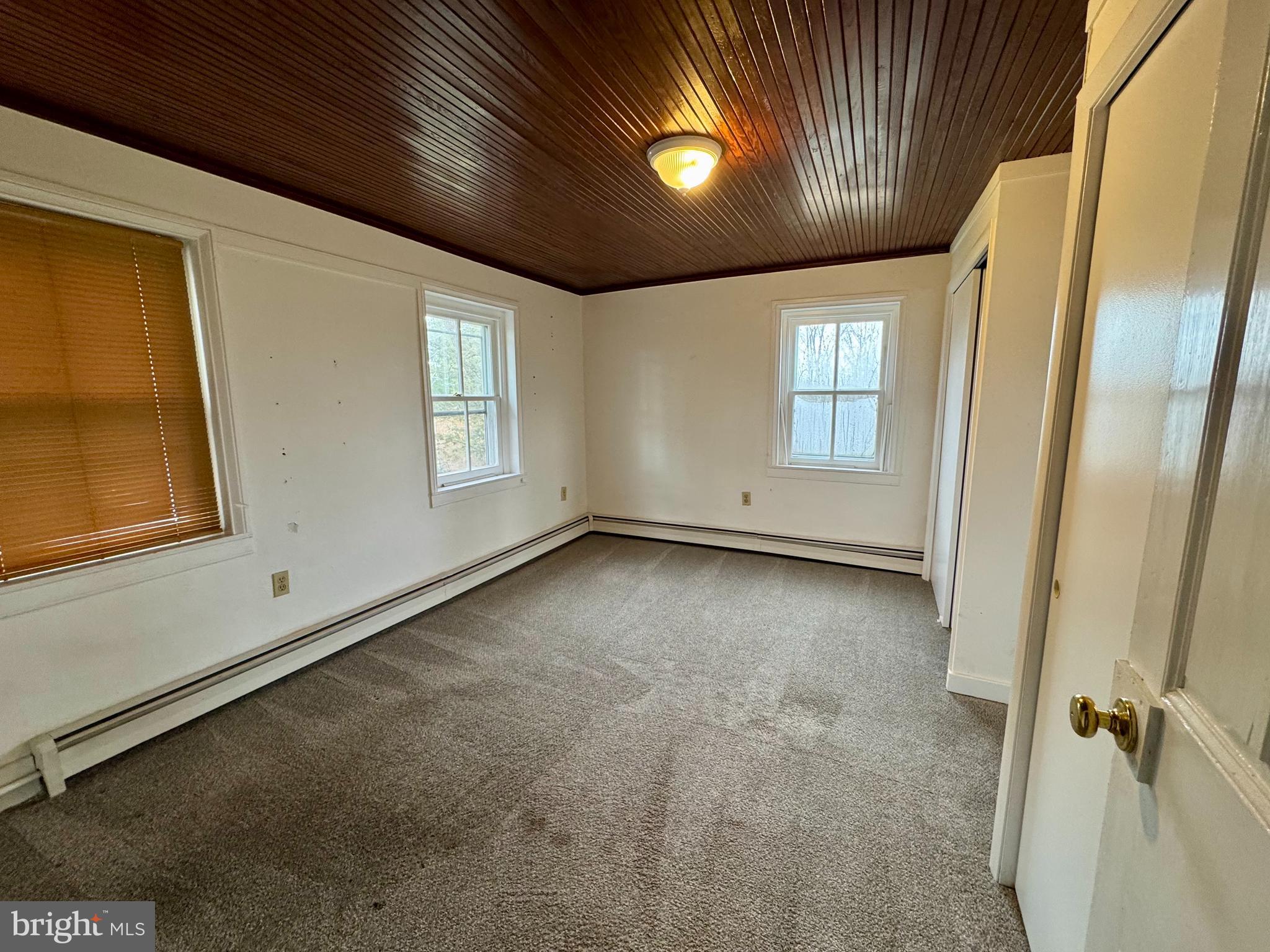 180 Sassamansville Road Gilbertsville, PA 19525 - Photo 13 of 20 an empty room with windows