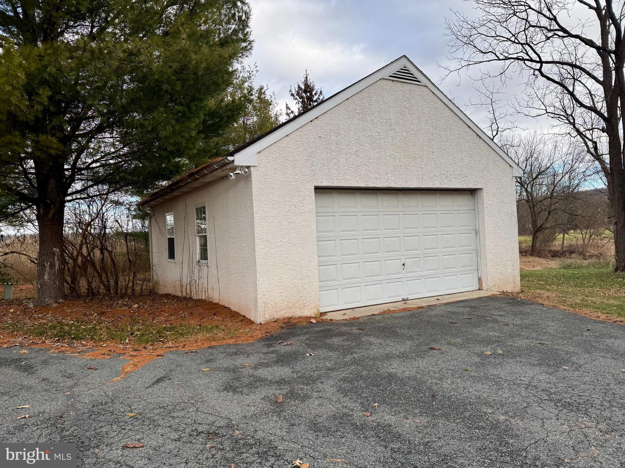 180 Sassamansville Road Gilbertsville, PA 19525 - Photo 2 of 20 a house with a outdoor space
