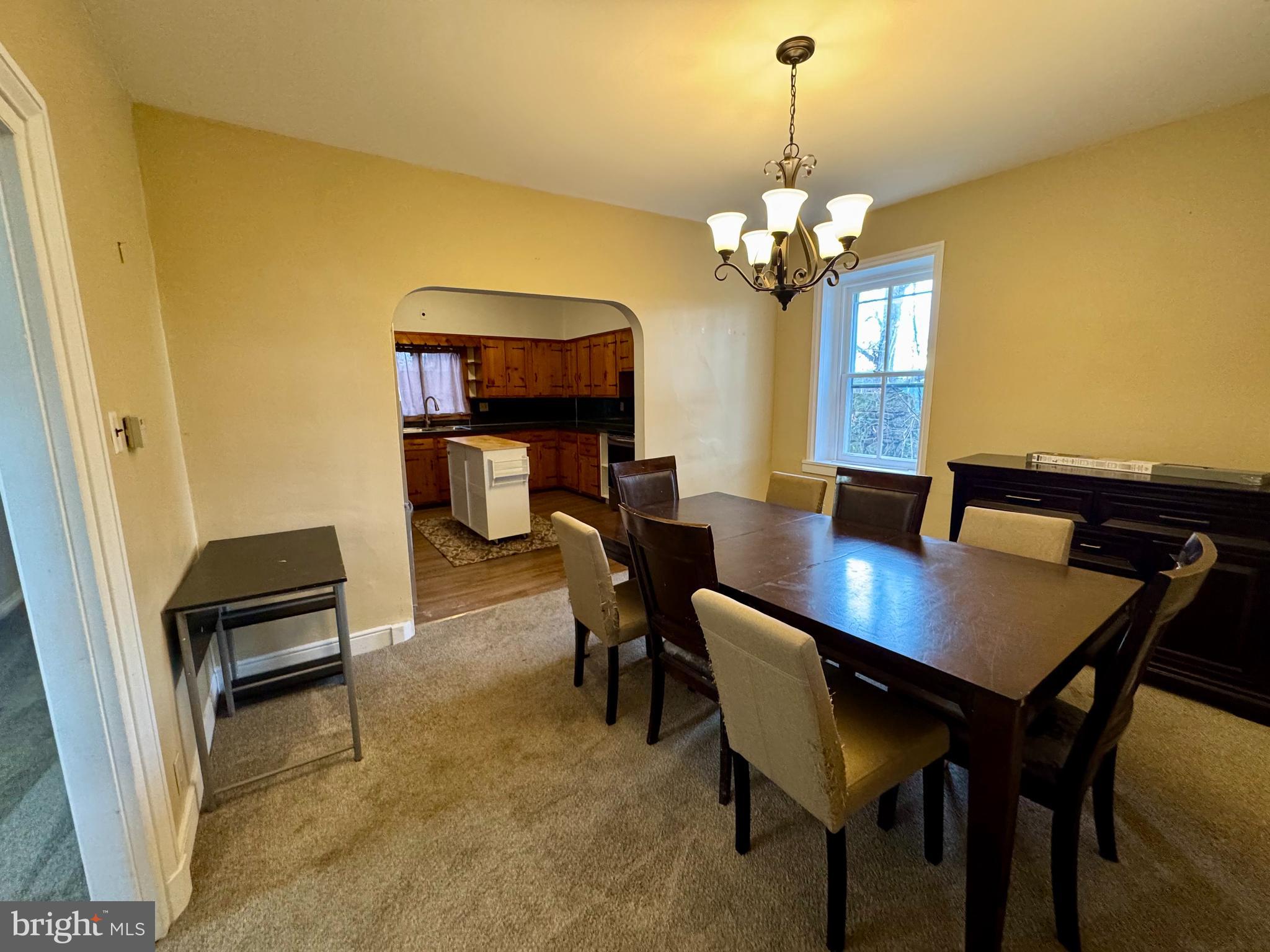 180 Sassamansville Road Gilbertsville, PA 19525 - Photo 8 of 20 a view of a dining room with furniture and a chandelier