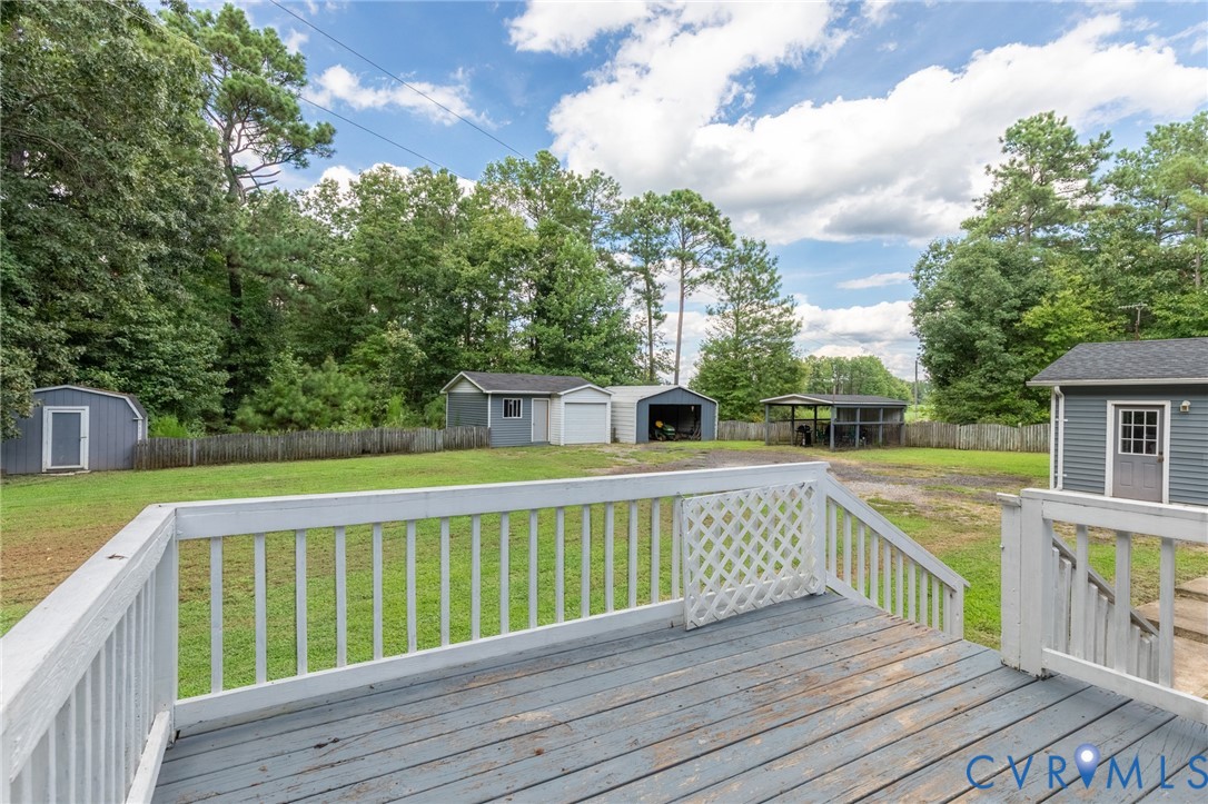 173 Antioch Road Warfield, VA 23889 - Photo 14 of 26 a view of deck with wooden floor and fence