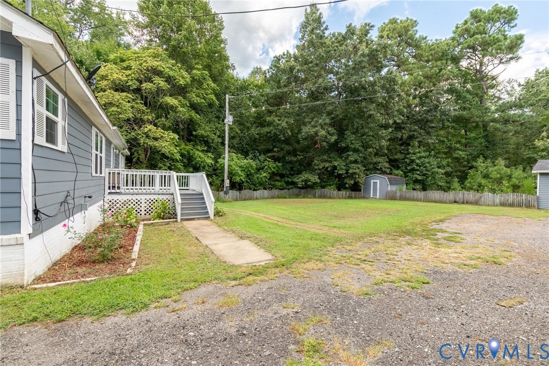 173 Antioch Road Warfield, VA 23889 - Photo 16 of 26 a view of a backyard with swimming pool