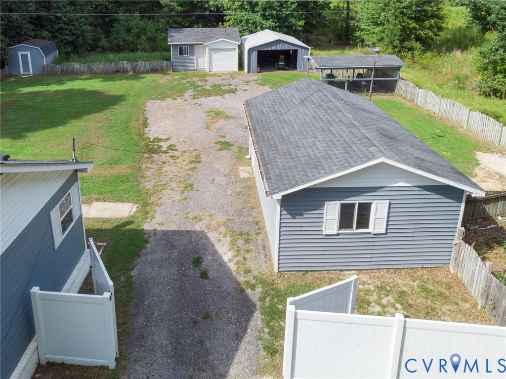 173 Antioch Road Warfield, VA 23889 - Photo 23 of 26 a view of a house with a yard and sitting area