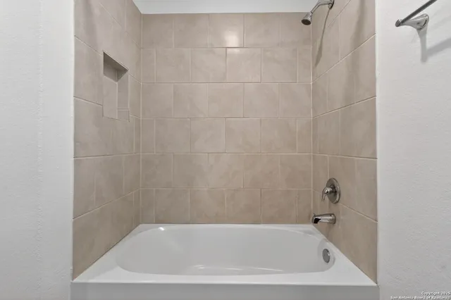 a bathroom with a bathtub