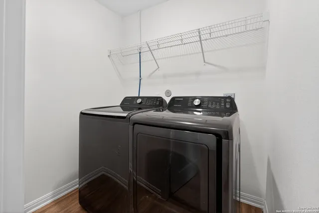 a utility room with dryer and washer