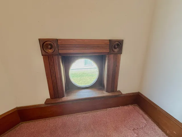 a view of a livingroom with wooden floor