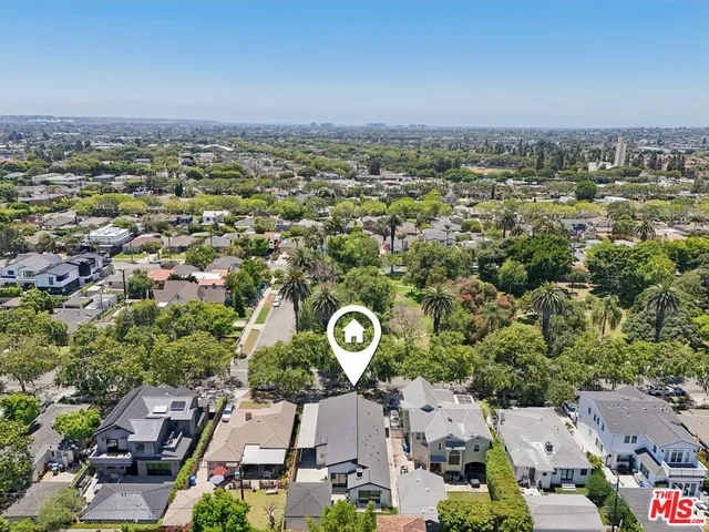 an aerial view of a city with lots of residential buildings