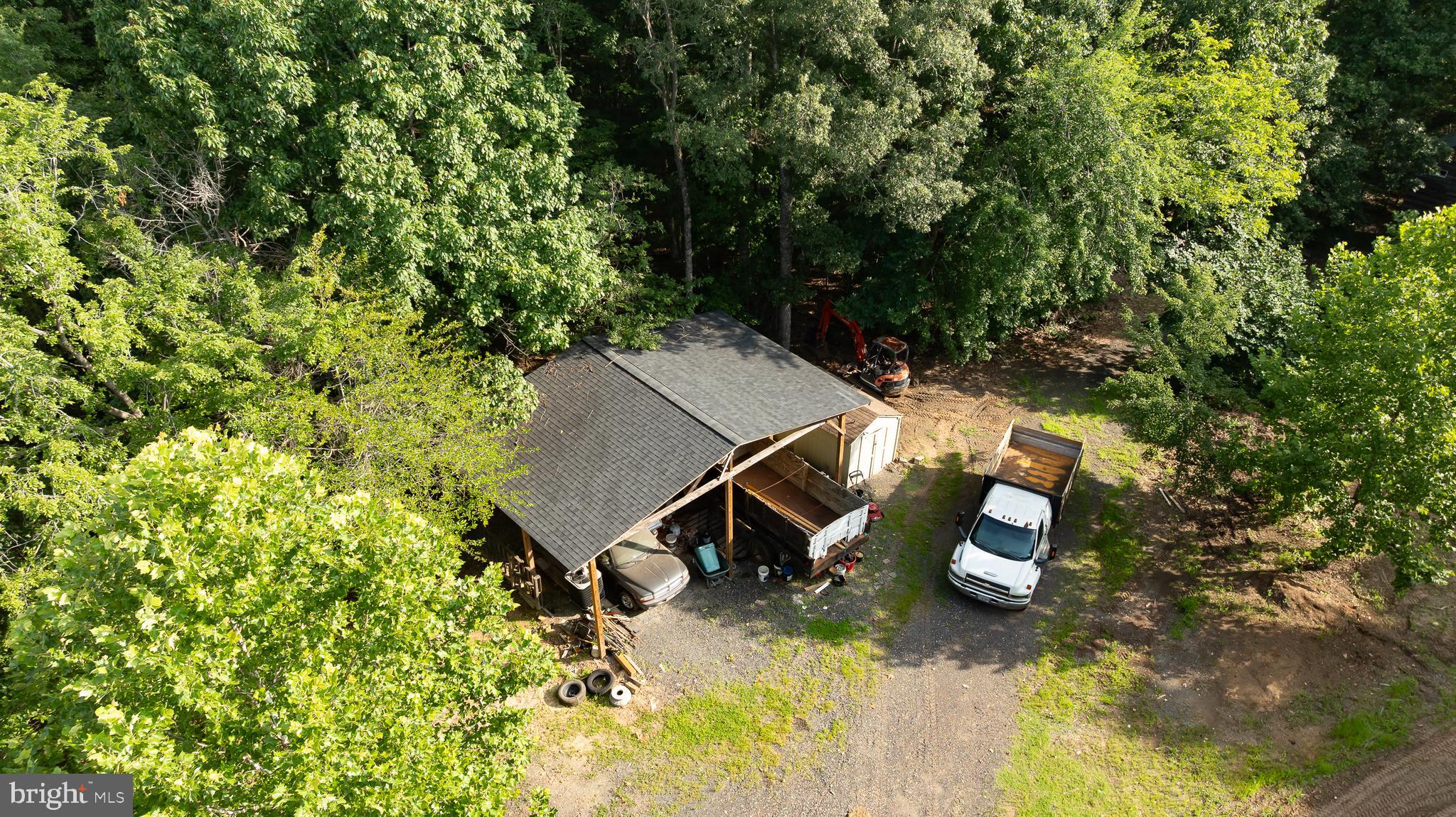 Germanna Highway Locust Grove, VA 22508 - Photo 6 of 26 a view of a backyard with chairs and a tree