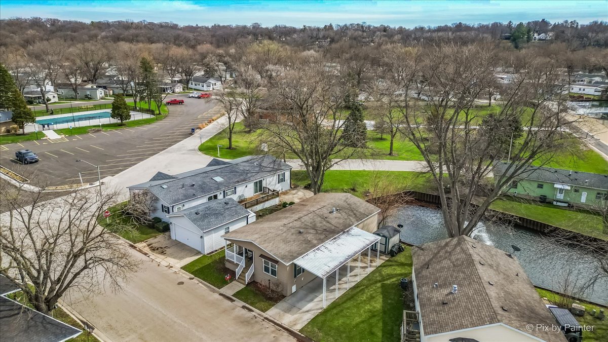 173 Northshore Road Elgin, IL 60123 - Photo 2 of 39 an aerial view of a house with a yard basket ball court and outdoor seating