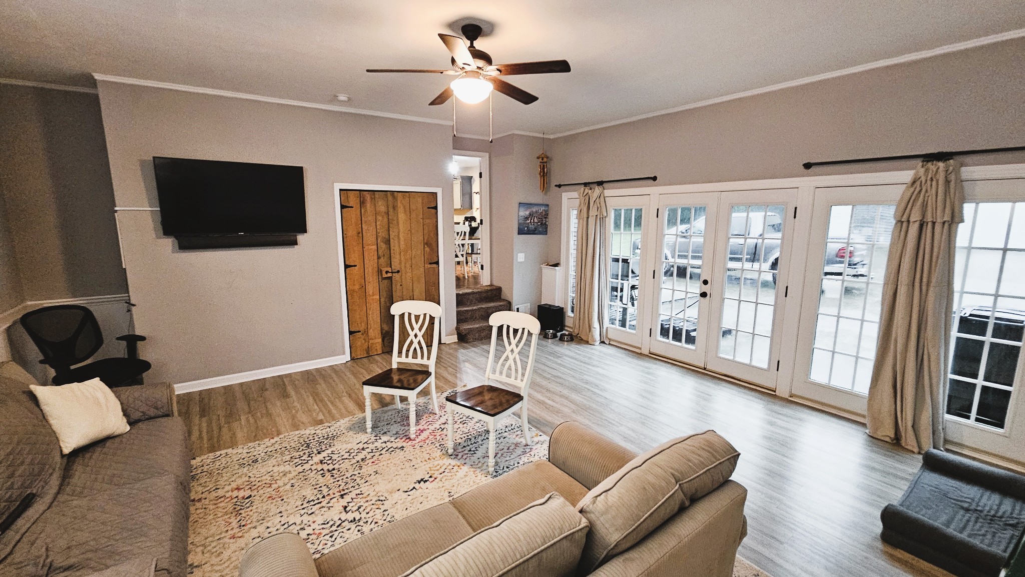 313 Lee Road Cottontown, TN 37048 - Photo 3 of 43 a living room with furniture and a flat screen tv