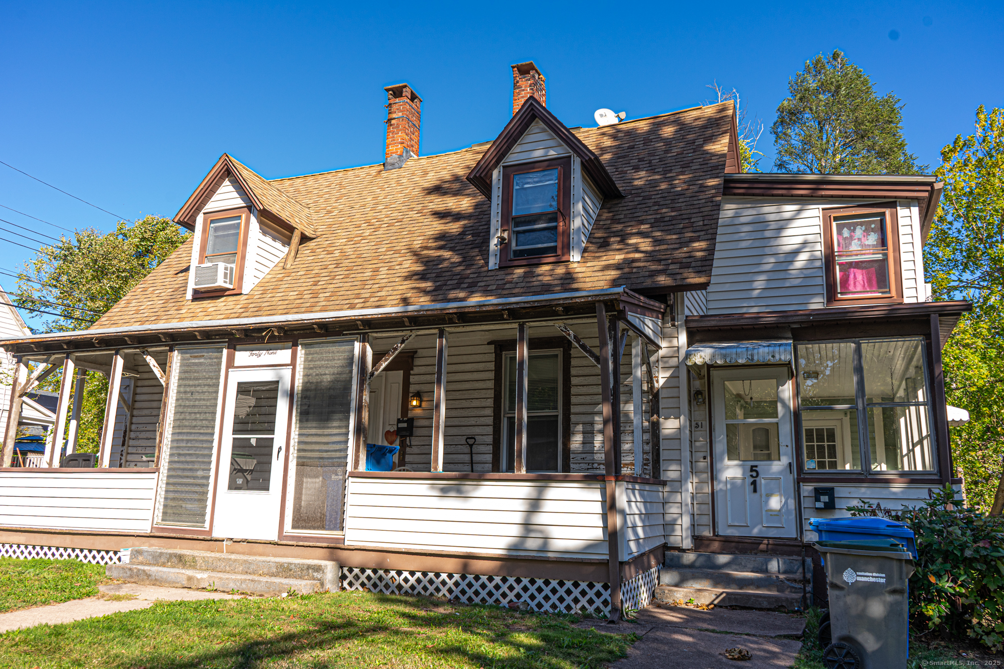 51 Cedar Street Manchester, CT 06040 - Photo 1 of 1 a view of a house with a porch