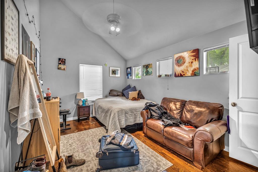 4517 Depew Avenue Austin, TX 78751 - Photo 11 of 20 a living room with furniture and a flat screen tv