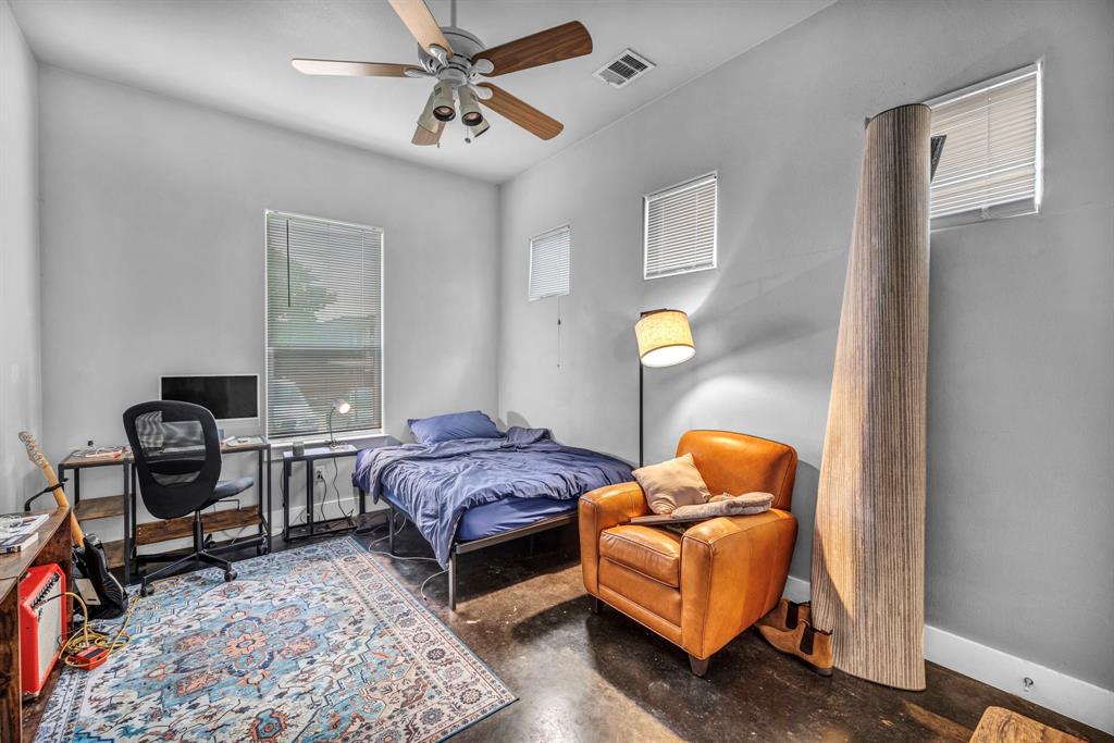 4517 Depew Avenue Austin, TX 78751 - Photo 9 of 20 a bedroom with bed and window