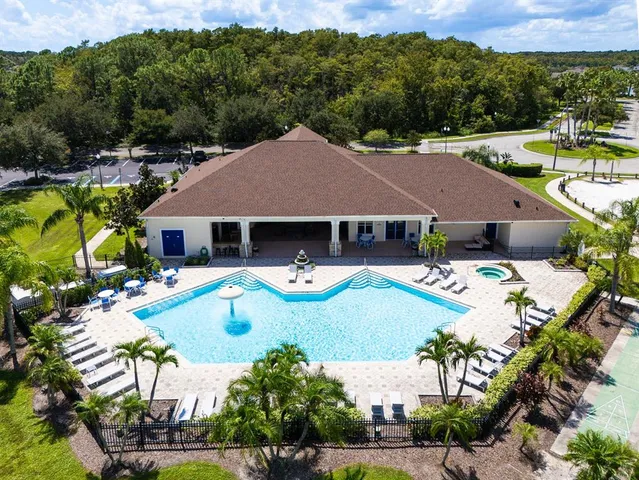 a living room with furniture fireplace and a flat screen tv