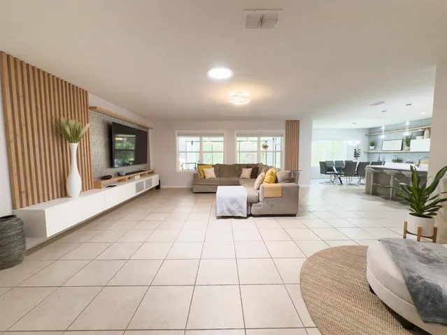 a kitchen with a sink a counter top space and appliances