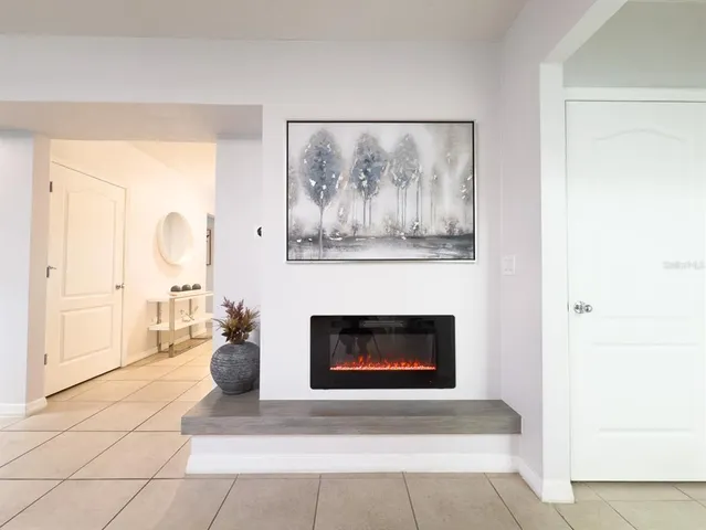 a view of walk in closet with clothes