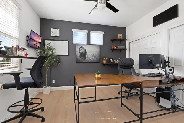 a room with furniture and a flat screen tv