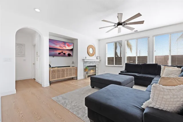 a living room with furniture and a window