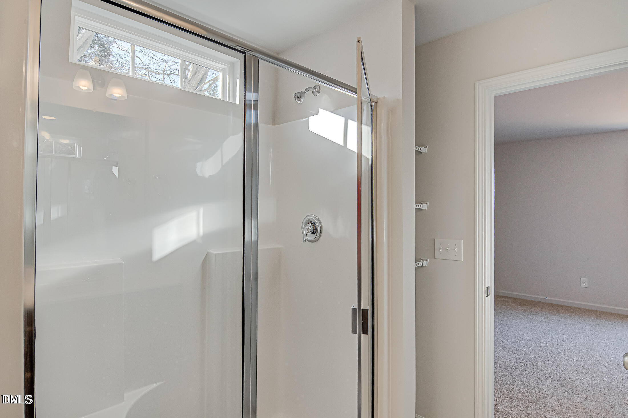 2304 Broad Street Durham, NC 27704 - Photo 31 of 39 a bathroom with a glass shower door and a glass door