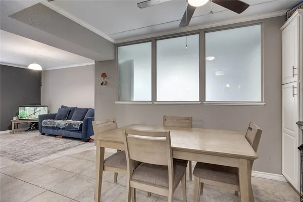 a workspace with furniture and window