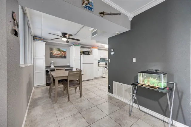 a view of kitchen with furniture and a window