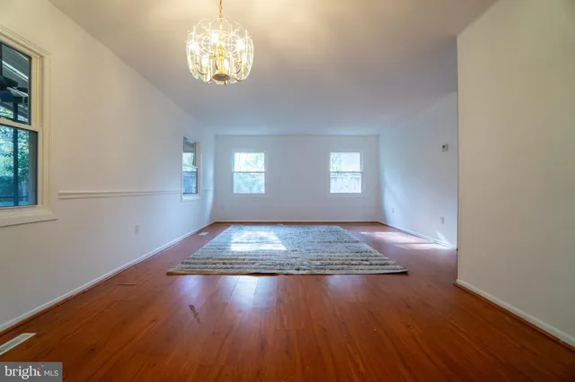 a view of livingroom with hardwood floor and window