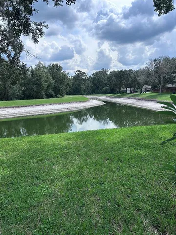 a kitchen with stainless steel appliances a sink and cabinets